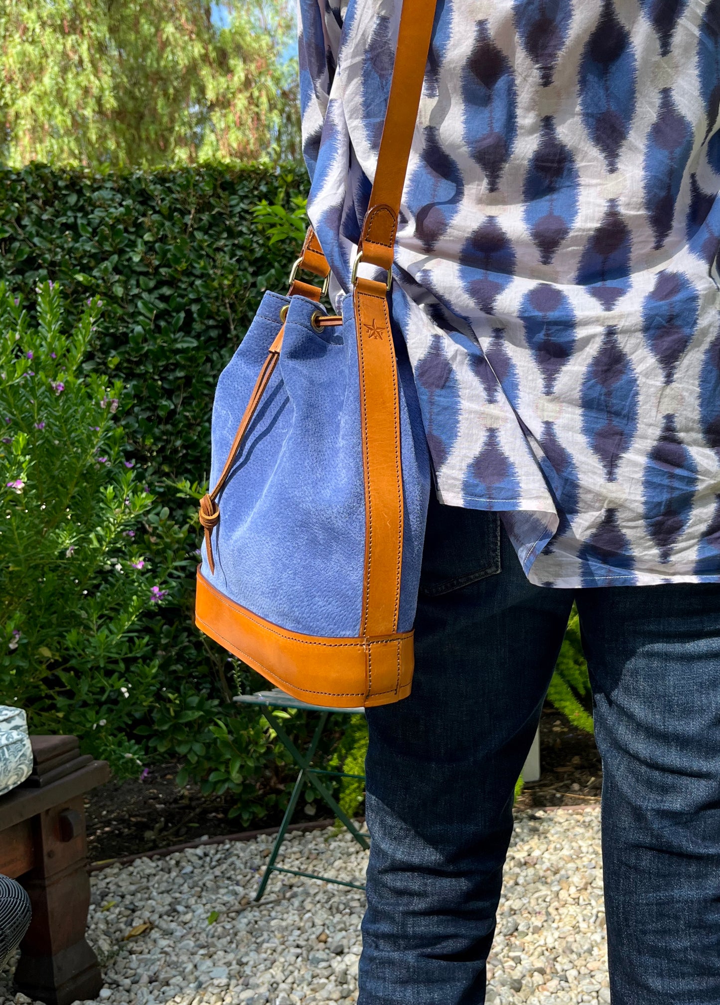 Blue suede bucket bag